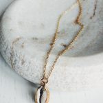 Cowrie sea shell pendant