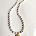 Ancient Maya disk natural pearls pendant