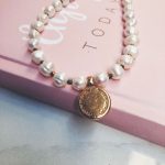Ancient Maya disk natural pearls pendant