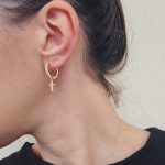 Cross hoop earring